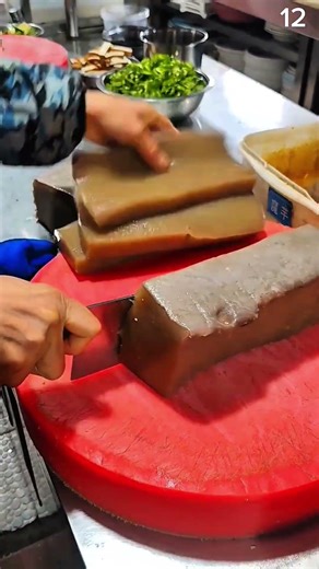 Slicing brown jelly block, crisp rhythm of morning kitchen craft