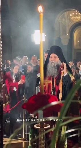 A solemn moment from an Eastern Orthodox Christian service, where tradition meets deep spirituality