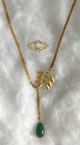 1.8K views · 32 reactions | Beautiful trendy gold chain ....with  leaf motive and a lovely emrald drops.......18 inches .........14 carrat hallmark...... lowest price guaranteed... For booking whatsapp -9073766134. | Lavya jewels | Facebook