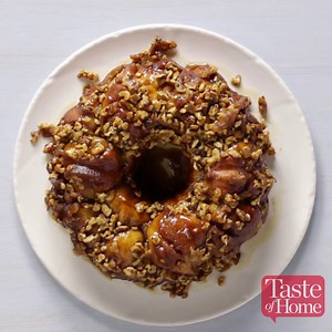 Cream cheese is tucked into biscuit dough and baked in a delectable sticky bun sauce to make pull-apart perfection. FULL RECIPE for Surprise Monkey Bread: http://spr.ly/6185BhXZ7 | Taste of Home