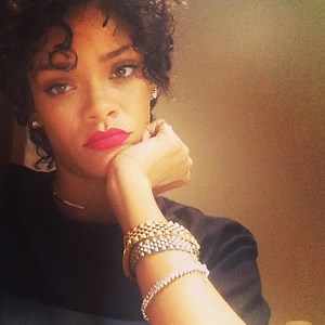 Rihanna Debuts New Hair While Wearing Her Signature Lipstick