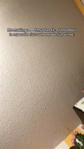 Intimate Moments: Two Boys Sharing a Cuddle in Class