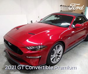 7.7K views · 15 reactions | We can’t take our eyes off this red-hot  pony! Ready and rearing for the streets, featuring a Rapid Red exterior plus an all black interior, this 2021 Ford Mustang GT Premium Convertible is  perfect. Thanks for sharing with us, John Latham! Join the #Ford family: https://bit.ly/2JByOUT. | Midwest Ford Dealers | Facebook