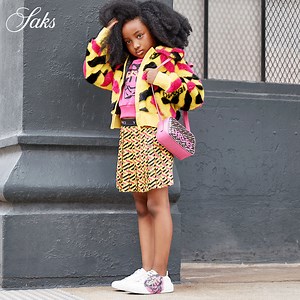 The latest @versace's kids' collection features the brand's bold new monogram and graffiti medusa logo. | Saks Fifth Avenue