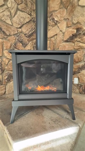 Warm Solutions Inc American Chimney Services on Instagram: "Out with the old in with the new! The @envirofireplaces freestanding Westport has a modern design, efficient heating, ease of use (remote/thermostat control, battery ignition), and value, offering significant warmth and ambiance with realistic flames. 🔥 #fire #gasstove #relax #ambiance #efficient #noppwernoproblem"