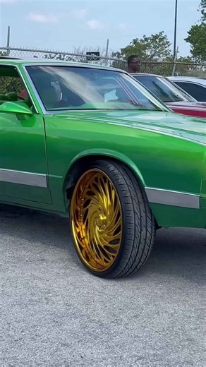 Candy green Chevy Monte Carlo on gold 26’s