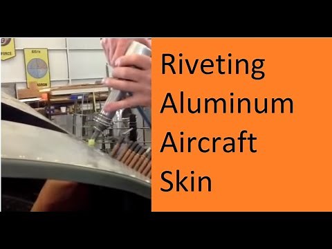 Riveting the top skin on a B-17 Flying Fortress -- Restoring the Champaign Lady WWII aircraft