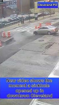 New street cam video shows the moment a sinkhole opens in Cleveland