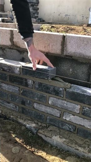 Laying a Blue Face Concrete Brick on a beautiful sunny day #bricklayer #brickwork #sitework