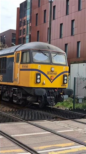 GBRF class 69 pulling a DB class 66 through Lincoln on 0E30