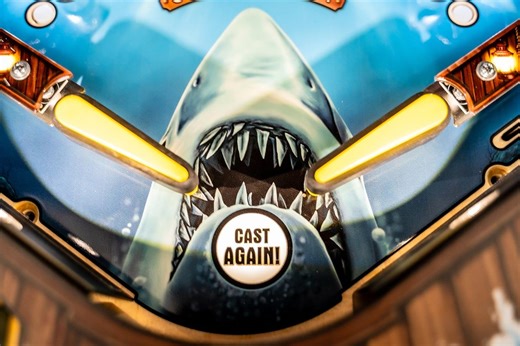 New JAWS Pinball Machine from Stern Has Original Movie Footage, Shark Toys, and Lots of Blood