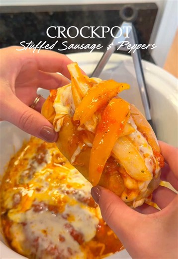 Crockpot Cheese Stuffed Sausage & Peppers Ingredients 2 packages sweet Italian sausage 12 mozzarella cheese sticks 2 bell peppers, sliced 1 large onion, sliced 1 jar marinara sauce Garlic powder, to taste Onion powder, to taste Italian seasoning, to taste Salt, to taste Black pepper, to taste Shredded mozzarella cheese, for topping Buns, for serving Directions 1. Slice each Italian sausage lengthwise, being careful not to cut all the way through. Stuff a mozzarella cheese stick inside each sausa