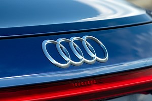 Audi : l’histoire fascinante derrière son nom et son emblématique logo