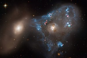 Nasa reveals stunning image of space triangle made by tsunami of star births