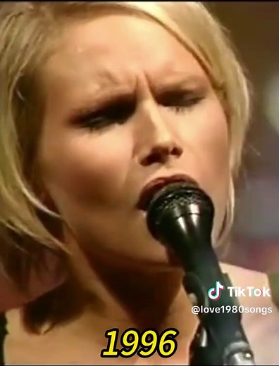 Love Me Love - The Cardigans: A 90s Music Classic