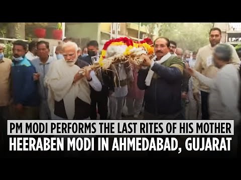 PM Modi performs the last rites of his mother Heeraben Modi in Ahmedabad, Gujarat