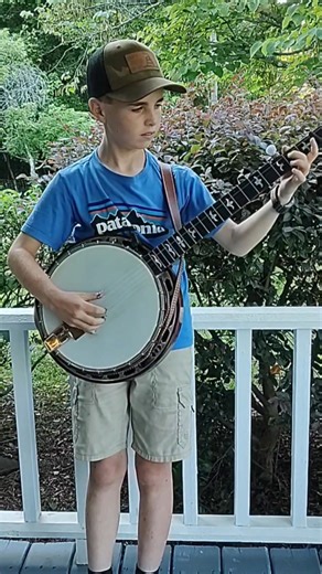 217K views · 13K reactions | When he started playing banjo, it was almost as big as he was. We always joked that we were going to get an arm stretcher to help him reach down the neck! #banjo #bluegrass | The Biscuit Eaters | Facebook