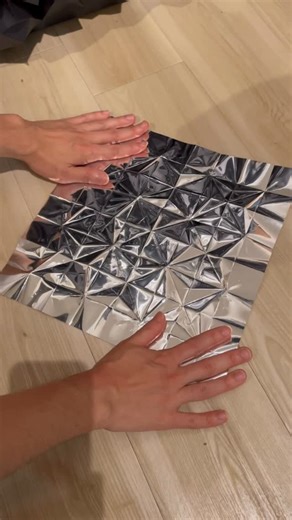 D.Hinklay on Instagram: "Folding reflective sheet into geometric forms. Origami; Spark(Reflective sheet) I made it from a piece of paper and didn’t cut any part of paper to create it. I designed it myself. My artworks are available on my site🤘 #origami #geometric #asmr #折り紙 #reflection #silver"