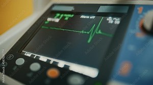 Vital Signs Monitor Showing Heart Rate and Other Medical Parameters on a Digital Display. Patient's Vitals on a Screen in Healthcare Hospital. ECG Graph on Intensive Care Unit.