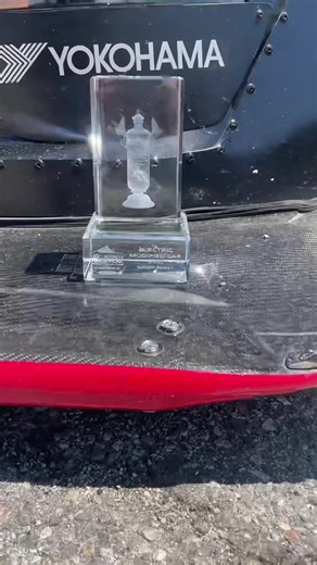 31 reactions | One for the Record Books- Dark Helmet poses with Randy Pobst Pikes Peak 2023 trophy… Randy took Dark Helmet up Pikes Peak this year with a sub-10 minute time of 9:54 setting an all-time record for fastest production-based electric car (stock or modified) | Unplugged Performance | Facebook