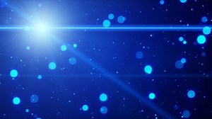 散景灯和发光的蓝色。计算机生成抽象运动无缝循环背景