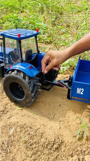 RC Newholland tractor Attached the trolley from parking