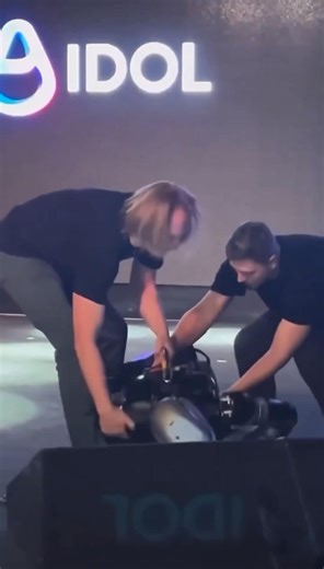 👀 Russia's first humanoid robot, powered by artificial intelligence, face plants while walking out to the Rocky theme song at a Moscow tech show and hilarity ensues! 😂 | News Snapper