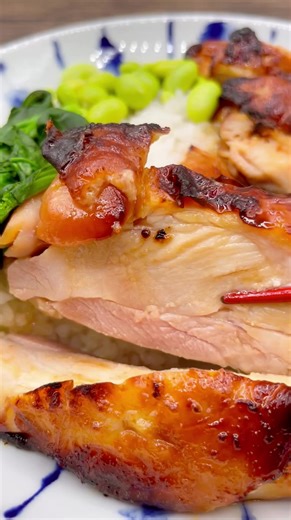 🍗 Miso Glazed Chicken – Crispy, Juicy, and Packed with Flavor! 🍯 Marinated overnight for deep, umami-rich flavor, this Miso Glazed Chicken is sweet, savory, and perfectly caramelized! Cooked in the air fryer, it’s crispy on the outside, juicy on the inside, and pairs beautifully with rice, edamame, and spinach. Ingredients: For the Chicken: \t•\t2 large chicken thighs with skin For the Marinade: \t•\t1/4 cup brown sugar \t•\t1/4 cup mirin \t•\t1/3 cup miso \t•\t3 tbsp soy sauce For Serving: \t