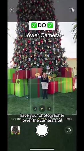 EASY CHRISTMAS TREE PHOTO HACK 📸🎄 Posing in front of a really tall Christmas tree? Here’s the easiest way to get photos you’ll *actually* like… ❌ DON’T: Stand too close to the tree! We want to see both you AND the tree, and when you stand too close you end up looking super tiny and blend in with the background. ✅ DO: Have your photographer lower the camera slightly, so we can see more of the tree. Zoom out to 0.5x. Walk closer to your photographer so your full body is in the shot, but you are 