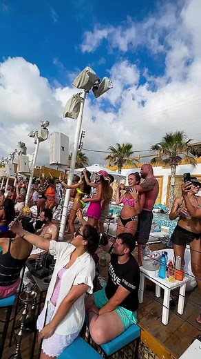 Poolside Party Fun: Dancing and Relaxation Outdoors