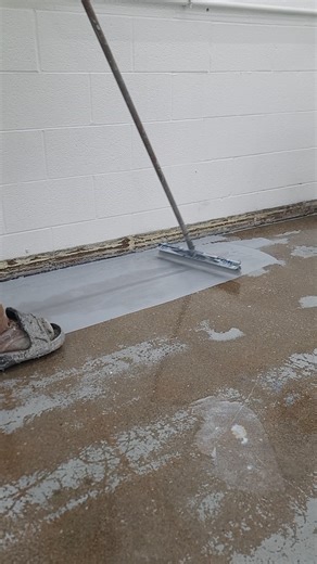 Watch that glossy transformation! ✨ Applying a self-leveling floor coating is one of the most satisfying jobs. That's how you get a perfectly smooth, durable floor. #epoxyfloor #concretecoating #floorcoating #satisfyingvideos #diyflooring #epoxy #industrialdesign | Columbus Epoxy Flooring