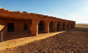 Witness the revival of mud brick architecture in the Middle East, showcasing its thermal properties and sustainable building practices in insightful 4K hyperrealistic video.