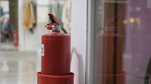 A Cylinder With Fire Extinguisher Stands At Stock Footage SBV-348427785 - Storyblocks