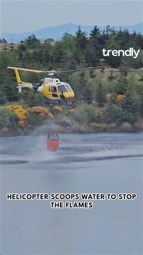 Wildfire Response Captured as Helicopter Battles Flames