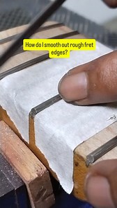 How do I smooth out rough fret edges? Here, I'm just using a regular file with smoothed edges to avoid damaging the fretboard. To smooth out rough fret edges, I can also use a stewmac file. Follow me for more #guitar #guitarrepair #guitarsetup #guitarra #guitarist | Purwanto Djoko
