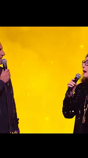 🇬🇷❤️ Amazing! The legendary Nana Mouskouri at 91 sang so beautifully with fellow Greek journalist, Nikos Aliagas! Nana Mouskouri has sold 350 million albums worldwide. Nana is the second highest selling female artist, only after Madonna. However, before Celine Dion. She has released 200 albums throughout her career in 12 different languages. Story: greekgateway.com/news/nana-mouskouri-the-worlds-highest-selling-female-artist-turns-91/ | GREEK GATEWAY