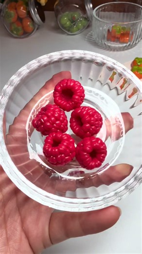 Help me decide 🥹 #raspberry #clay #polymerlcay #clayart | Clay