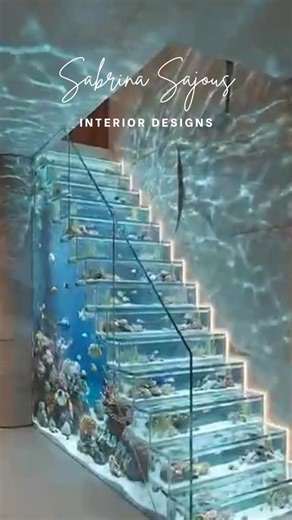 Sabrina Sajous Design on Instagram: "🐠✨ Make a Splash with Aquarium Stairs! Transform your staircase into a living work of art with an aquarium-inspired design. Not only does it create a stunning focal point, but it also brings nature and tranquility into your home. 💡 Tips for Designing Aquarium Stairs: Lighting is Key: Use soft LED lights to highlight the aquatic life and create a magical ambiance at night. Choose the Right Fish & Plants: Opt for low-maintenance aquatic life that thrives in c