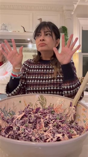 Nisha Katona on Instagram: "Delicious Red Cabbage and Cashew Slaw- shred along! Apologies for the noise and chatter but these videos really are just me cooking at home in amongst ….. and FOR the chaos 🙏🏽💕 Great served with jacket potatoes and a roast chicken or lamb leg Full recipe in my Curry Club link in bio https://curryclub.theclubb.co Bowl @rosetulipani Jumper @thefoldlondon"