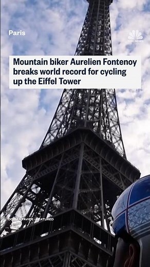 Mountain biker Aurelien Fontenoy breaks world record for cycling up the Eiffel Tower