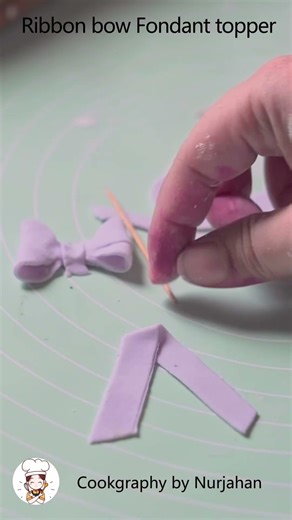 How to make fondant ribbon bow🎀 #youtubeshorts #caketopper #cakeart #fondant#bow#fondantcake