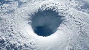 Download Hurricane Seen From Space Shows the Eye of the Storm Over the Ocean for free