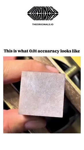 crazy & trending video on Instagram: "The video depicts a craftsman using a blue marker to draw parallel lines on a metal square, then precisely scraping away ink with a chisel to reveal a flawless grid pattern, emphasizing manual precision equivalent to 0.01 mm accuracy. Posted by @Zzzenitsu___ , who shares random videos, it credits Instagram creator @expelainer .zone and has exploded to nearly 2 million views and 1,900 likes in under a day, tapping into ASMR and DIY crafting trends. The techni