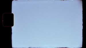 Authentic Super 8 Film Frame Scan with Lens Flare, Light Leaks and Film Grain for Overlays. Create the retro vintage look with your digital footage. With authentic camera sound.