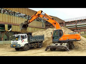 DOOSAN DX 210W Excavator for Digging and Loading Earth, Dump Truck for Transporting and Disposing...