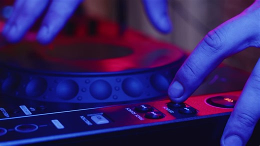 Closeup of a DJ mixing music on a turntable - Free Stock Video