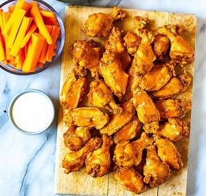 These Instant Pot Chicken Wings are the BEST out there and come together with just a 3-ingredient buffalo wing sauce. They are so easy to make and involve no deep frying either! • 170 calories per 2 wings • PRINT RECIPE>>>https://eatinginstantly.com/the-best-instant-pot-chicken-wings/ | Eating Instantly - Healthy Instant Pot Recipes