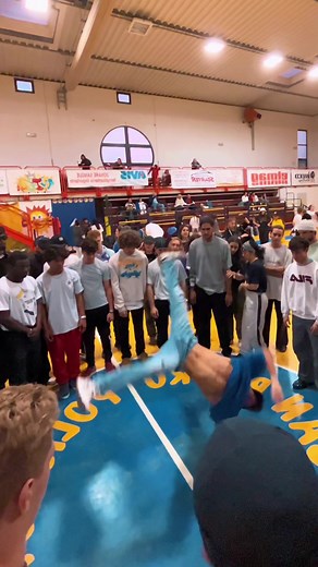 Exciting Breakdancing Performance in Gymnasium