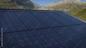 Closeup Animation of solar panels on the roof of a modern house.