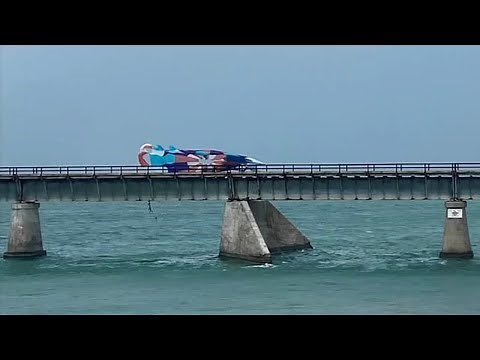 Woman killed, 2 kids injured in parasailing accident